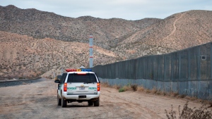In this Jan. 4, 2016, file photo, a U.S. Border Patrol agent patrols Sunland Park along the U.S.-Mexico border next to Ciudad Juarez. (AP Photo/Russell Contreras, File)