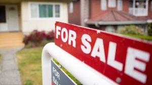 A real estate sign is pictured in Vancouver on June, 12, 2018. THE CANADIAN PRESS Jonathan Hayward