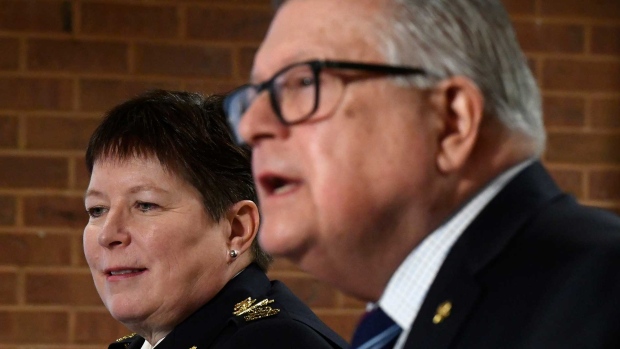 RCMP Commissioner Brenda Lucki, left, listens as Minister of Public Safety and Emergency Preparedness Ralph Goodale speaks during a press conference on the RCMP's new Interim Management Advisory Board in Ottawa on Wednesday, Jan. 16, 2019. THE CANADIAN PRESS/Justin Tang