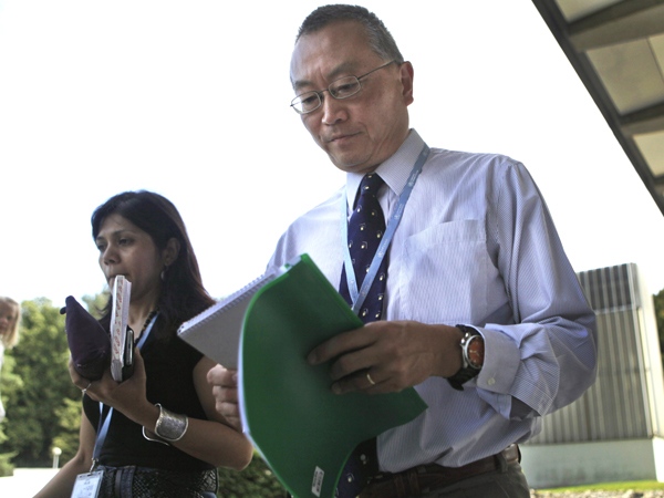 Keiji Fukuda, Assistant Director-General for Health Security and Environment at the World Health Organization (WHO) leaves his office at the WHO headquarters in Geneva, Switzerland