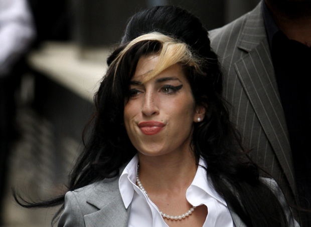 British singer Amy Winehouse arrives at Westminster magistrates court in London, Friday, July 24, 2009. (AP / Kirsty Wigglesworth)