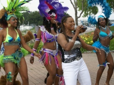Calypso singer Susan G and Caribana participants entertain the crowd at Ontario Place. (CP24/Rajeshni Naidu)