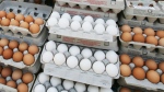In this May 14, 2008 file photo, cartons of eggs are displayed for sale in the Union Square green market in New York. (AP Photo/Mark Lennihan)
