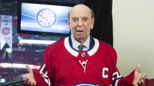 Legendary broadcaster Bob Cole poses prior to calling his last NHL hockey game as the Montreal Canadiens play the Toronto Maple Leafs in Montreal, Saturday, April 6, 2019. THE CANADIAN PRESS/Graham Hughes