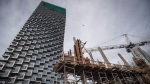 Workers assemble concrete forms at a condo tower under construction, in Vancouver on Friday, Oct. 26, 2018. THE CANADIAN PRESS/Darryl Dyck