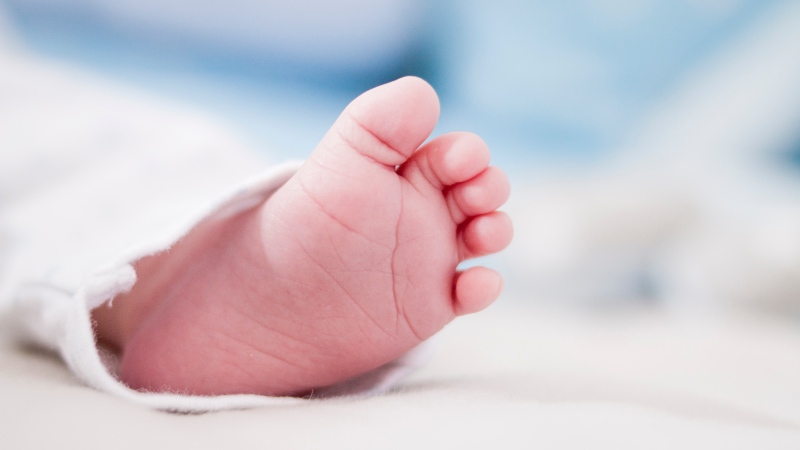 The foot of a newborn baby is pictured. (Dominika Roseclay/Pexels)