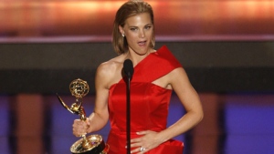 Gina Tognoni accepts the award for outstanding supporting actress in a drama series for her work on 'Guiding Light' at the 35th Annual Daytime Emmy Awards in Los Angeles on Friday, June 20, 2008. (AP / Matt Sayles)