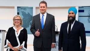 Green Party Leader Elizabeth May, left, Conservative Leader Andrew Scheer, centre, and NDP Leader Jagmeet Singh pose for a photograph before the Maclean's/Citytv National Leaders Debate in Toronto on Thursday, September 12, 2019. THE CANADIAN PRESS/Frank Gunn