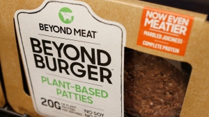 In this June 27, 2019, file photo a meatless burger patty called Beyond Burger made by Beyond Meat is displayed at a grocery store in Richmond, Va. Beyond Meat reports financial earns Monday, Oct. 28. (AP Photo/Steve Helber, File)