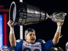 Winnipeg Blue Bombers' Andrew Harris celebrates winning the 107th Grey Cup against the Hamilton Tiger Cats in Calgary, Alta., Sunday, November 24, 2019. THE CANADIAN PRESS/Todd Korol