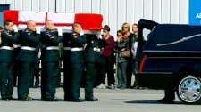 The casket for Pte. Patrick Lormand is carried to a hearse during his repatriation ceremony at CFB Trenton on Wednesday, Sept. 16, 2009.