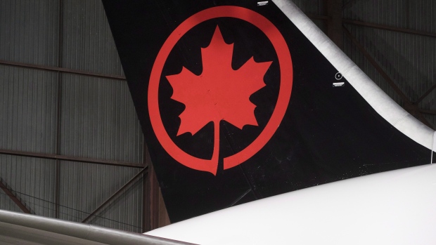 The tail of the newly revealed Air Canada Boeing 787-8 Dreamliner aircraft is seen at a hangar at the Toronto Pearson International Airport in Mississauga, Ont., Thursday, February 9, 2017. THE CANADIAN PRESS/Mark Blinch