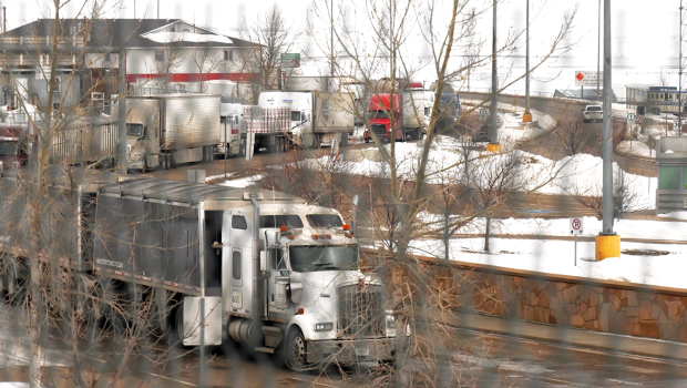 Alberta premier says truckers’ border blockade violates traffic laws and must end