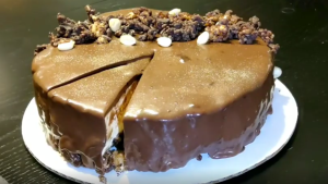 Chocolate Peanut Butter Mousse Crunch Cake