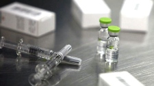 Vials of H1N1 flu vaccine by Beijing-based drug maker Sinovac Biotech Ltd. are on display at Sinovac in Beijing, China, Thursday, Sept. 3, 2009. (AP Photo / Elizabeth Dalziel)