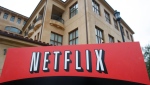 This Jan. 29, 2010, file photo shows the company logo and view of Netflix headquarters in Los Gatos, Calif. (AP Photo/Marcio Jose Sanchez, File)