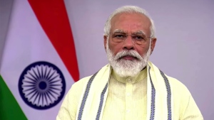 In this June 30, 2020, frame grab from video, Indian Prime Minister Narendra Modi speaks during a televised address to the nation in New Delhi, India. (Narendramodi.in via AP)