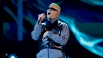 FILE - Bad Bunny performs a medley at the Billboard Latin Music Awards in Las Vegas on April 25, 2019. The Puerto Rican superstar is the music platform’s most-streamed artist of the year with 8.3 billion streams globally. The Latin Grammy winner and hitmaker, who released a new album last week, leads a top five list that also includes Drake, J Balvin, Juice WRLD and the Weeknd. (Photo by Eric Jamison/Invision/AP, File)