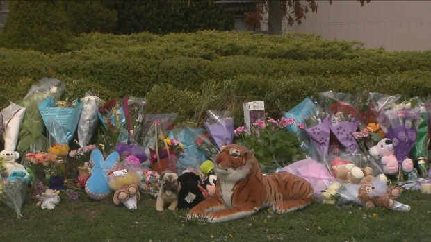 memorial, Vaughan, stuffed animals, flowers, 