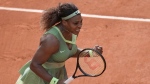 American tennis player Serena Williams celebrates after defeating fellow American Danielle Collins during their third round match on Day 6 of the French Open tennis tournament at Roland Garros in Paris, France, on Friday, June 4, 2021. (AP Photo/Christophe Ena)