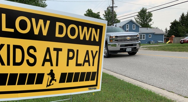 Slow down, kids at play sign