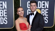 FILE - Scarlett Johansson, left, and Colin Jost arrive at the 77th annual Golden Globe Awards Jan. 5, 2020, in Beverly Hills, Calif. Johansson is a mom to two now. The “Black Widow” star recently gave birth to a son, Cosmo, with husband Colin Jost, the “Saturday Night Live” star said on Instagram Wednesday, Aug. 18, 2021. This is the first child for the couple, who were married last October. (Photo by Jordan Strauss/Invision/AP, File)