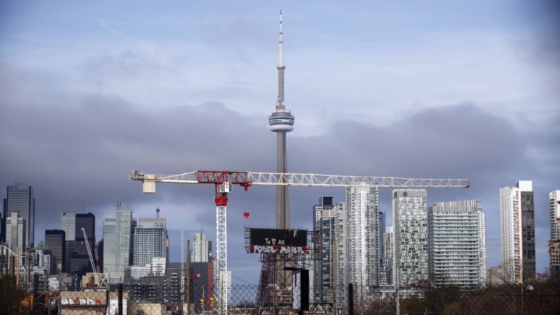 The CN Tower can be seen in the Toronto skyline in Toronto, Ontario on Tuesday, April 25, 2017. THE CANADIAN PRESS/Cole Burston 
