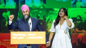 NDP Leader Jagmeet Singh and his wife Gurkiran Kaur Sidhu arrive on stage to deliver his concession speech at his election night headquarters during the Canadian federal election in Vancouver, Monday, September 20, 2021. THE CANADIAN PRESS/Jonathan Hayward 
