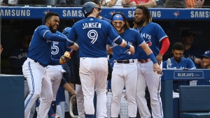 Toronto Blue Jays’ Danny Jansen (9) celebrates with Teoscar Hernandez, left, Bo Bichette and Vladimir Guerrero Jr., right, after hitting a solo home run in the fifth inning of an American League baseball game against the Baltimore Orioles in Toronto on Saturday, Oct. 2, 2021. THE CANADIAN PRESS/Jon Blacker 