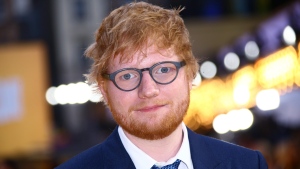 FILE - In this June 18, 2019, file photo, singer Ed Sheeran poses for photographers upon arrival at the premiere of the film "Yesterday'" in London. (Photo by Joel C Ryan/Invision/AP, File) 