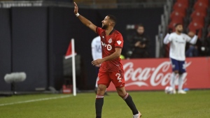 Toronto FC's Justin Morrow acknowledges the crowd as he leaves the pitch for the last time, retiring following the game against D.C. United' in MLS soccer action in Toronto on Sunday, Nov. 7, 2021. THE CANADIAN PRESS/Jon Blacker