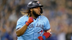 Toronto Blue Jays designated hitter Vladimir Guerrero Jr. (27) round the bases after hitting a two run home run during second inning MLB American League baseball action against the Baltimore Orioles, in Toronto, Sunday, Oct. 3, 2021. THE CANADIAN PRESS/Frank Gunn 