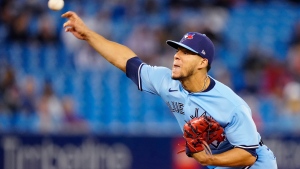 Toronto Blue Jays starting pitcher Jose Berrios throws against the New York Yankees during the first inning of baseball game in Toronto on Wednesday, Sept. 29, 2021. (Frank Gunn/The Canadian Press via AP, File)
