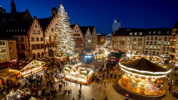 Lights illuminate the Christmas market in Frankfurt, Germany, Nov. 22, 2021.  (AP Photo/Michael Probst, File)