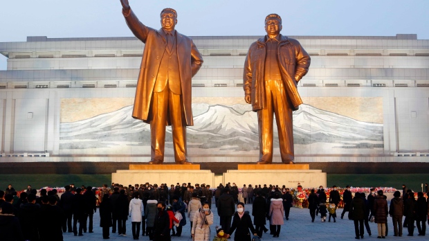 Kim Il Sung and Kim Jong Il 