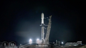 A SpaceX rocket launches from Vandenberg Space Force Base early Saturday, Dec. 18, 2021 at Vandenberg Space Force Base in California. The Falconâ€™s first stage successfully returned and landed on a SpaceX droneship in the ocean. It was the 11th launch and recovery of the stage, marking a milestone in reusability. The second stage continued into orbit and deployed the satellites. (SpaceX via AP)
