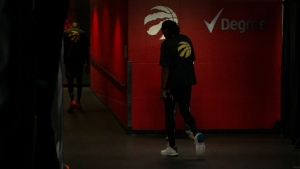 Toronto Raptors players head to the locker room after NBA basketball action against the Golden State Warriors in Toronto on Saturday, December 18, 2021. THE CANADIAN PRESS/Chris Young 