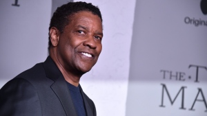 Actor Denzel Washington, who plays Macbeth in the film, arrives at the premiere of "The Tragedy of Macbeth" at the DGA Theater on Thursday, Dec. 18, in Los Angeles. (Photo by Jordan Strauss/Invision/AP) 
