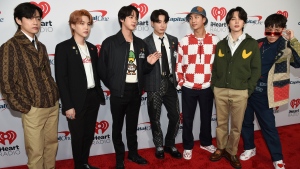 BTS arrives at the Jingle Ball at the Forum on Friday, Dec. 3, 2021, in Inglewood, Calif. (Photo by Richard Shotwell/Invision/AP) 
