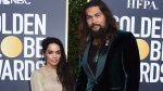 FILE - Lisa Bonet, left, and Jason Momoa arrive at the 77th annual Golden Globe Awards at the Beverly Hilton Hotel on Sunday, Jan. 5, 2020, in Beverly Hills, Calif. The couple have ended their 16-year relationship. A joint statement posted on the 'Aquaman' star's Instagram page Wednesday, Jan. 12, 2022, said that Momoa and his wife were parting ways. (Photo by Jordan Strauss/Invision/AP, file)
