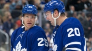FILE - Toronto Maple Leafs' Ondrej Kase (left) talks with Nick Ritchie during NHL hockey action against the Tampa Bay Lightning in Toronto, on Thursday, December 9, 2021.THE CANADIAN PRESS/Chris Young 
