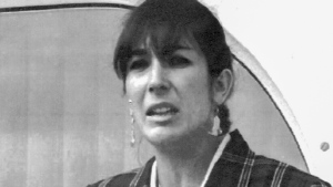 FILE - Ghislaine Maxwell, daughter of late British publisher Robert Maxwell, reads a statement expressing her family's gratitude to Spanish authorities after recovery of his body, in Nov. 7, 1991, in Tenerife, Spain. A late-June sentencing date was set Friday, Jan 14, 2022, for Maxwell following her conviction last month on charges including sex trafficking and conspiracy relating to the recruitment of teenage girls for financier Jeffrey Epstein to sexually abuse. (AP Photo/Dominique Mollard, File)
