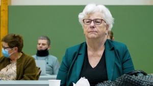 Psychiatrist Randi Rosenqvist sits in court on the second day of Norwegian mass killer Anders Behring Breivik's hearing where he is requesting release on parole, in Skien, Norway, Wednesday, Jan. 19, 2022. (Ole Berg-Rusten/NTB scanpix via AP)