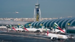 An Emirates jetliner comes in for landing at the Dubai International Airport in Dubai, United Arab Emirates, Dec. 11, 2019. (AP Photo/Jon Gambrell, File)
