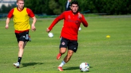 TFC's Alejandro Pozuelo moves on the ball while Jacob Shaffelburg looks on during the clubs first training session of the season in Irvine, California on Wednesday Jan. 19, 2022. THE CANADIAN PRESS/HO-Toronto FC-Eric Giacometti *MANDATORY CREDIT*