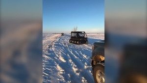 RCMP officers are shown near the town of Emerson, Manitoba on Wednesday Jan. 19, 2022. Mounties in Manitoba say they have found the bodies of four people — including an infant and a teen — near the United States border. THE CANADIAN PRESS/HO-RCMP
