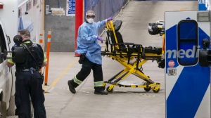 Paramedics are seen outside a Toronto Hospital on Wednesday, January 5, 2022.THE CANADIAN PRESS/Chris Young 