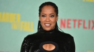 FILE - Regina King arrives at a special screening of "The Harder They Fall" on Wednesday, Oct. 13, 2021, at the Shrine in Los Angeles. Ian Alexander Jr., the only child of award-winning actor and director Regina King, has died. The death was confirmed Saturday, Jan. 22,2022 in a family statement. (Photo by Richard Shotwell/Invision/AP, File)