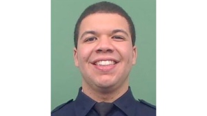 In an undated photo provided by the New York City Police Department, NYPD Officer Jason Rivera, who was killed in a police shooting, Friday, Jan. 21, 2022, in New York City, is seen. Officials say Rivera, 22, has been killed and fellow officer Wilbert Mora, 27, was critically wounded in a shooting in the Harlem neighborhood of New York. The officers had been responding to a call Friday about an argument between a woman and her adult son. (Courtesy of NYPD via AP)