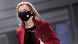 FILE - Britain's Foreign Secretary Liz Truss arrives for a G7 Foreign and Development Ministers Session with Guest Countries and ASEAN Nations in Liverpool, England Sunday, Dec. 12, 2021. (Olivier Douliery/Pool via AP) 